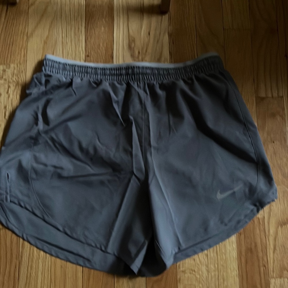 Grey Nike Dri Fit womens running shorts, New with Tag! Size small.